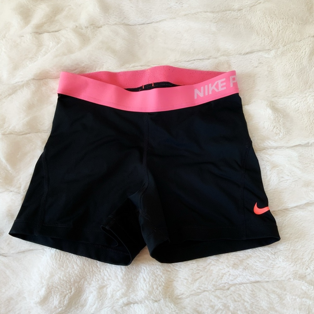 Nike spandex with a pink outlining